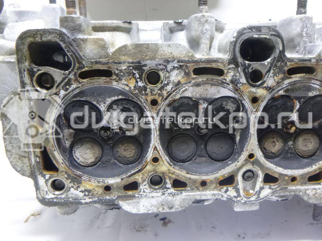 Фото Головка блока для двигателя G4EE для Hyundai Accent / Getz Tb 97 л.с 16V 1.4 л бензин 2210026100 {forloop.counter}}