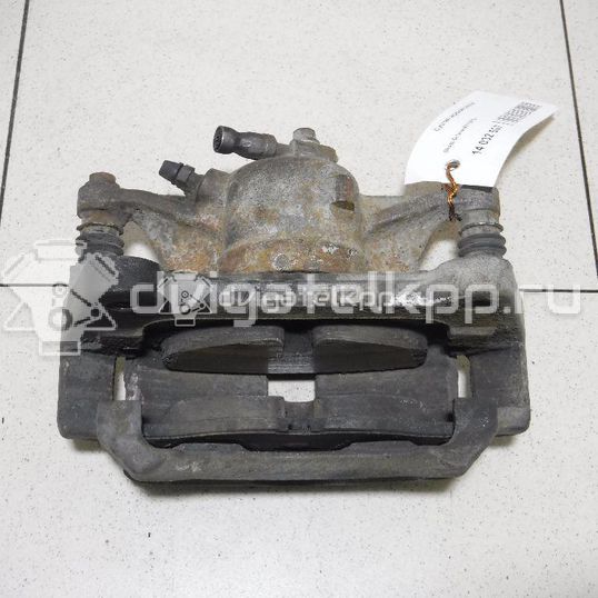 Фото Суппорт тормозной передний левый  8V0615123A для Seat Leon / Ateca Kh7