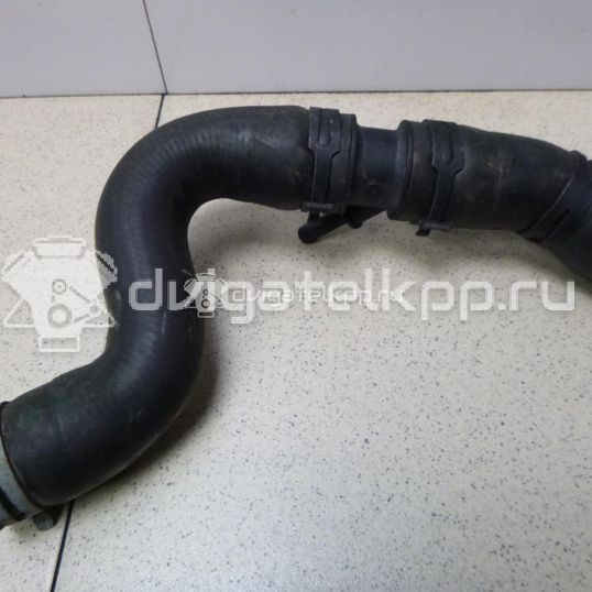 Фото Патрубок радиатора  6Q0122101CD для Skoda Fabia