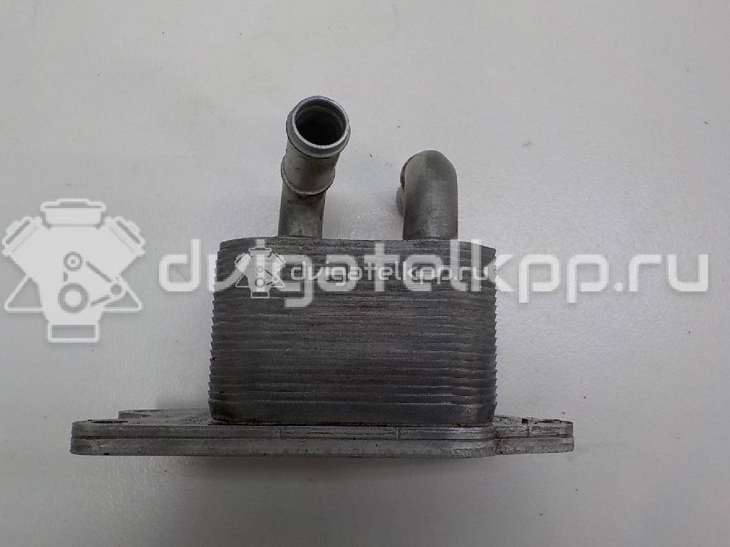 Фото Радиатор масляный  09G409061B для Skoda Roomster 5J / Fabia / Rapid {forloop.counter}}