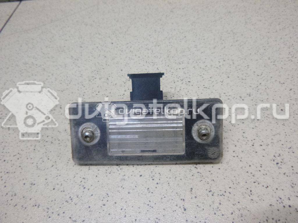 Фото Фонарь подсветки номера  6Y0943021E для Skoda Fabia / Yeti 5L {forloop.counter}}