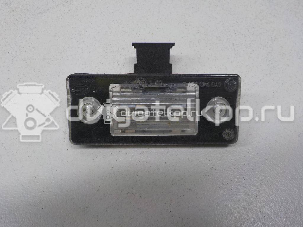 Фото Фонарь подсветки номера  6Y0943021E для Skoda Fabia / Yeti 5L {forloop.counter}}