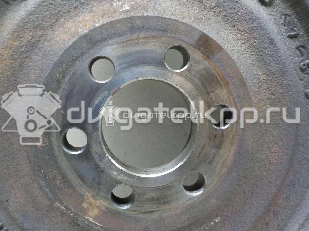 Фото Маховик для двигателя QG18DE для Nissan Primera / Almera 106-128 л.с 16V 1.8 л бензин 123119F600 {forloop.counter}}